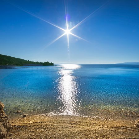 Boutique & Design Hotel Navis Opatija Exterior photo The sun shining on the sea