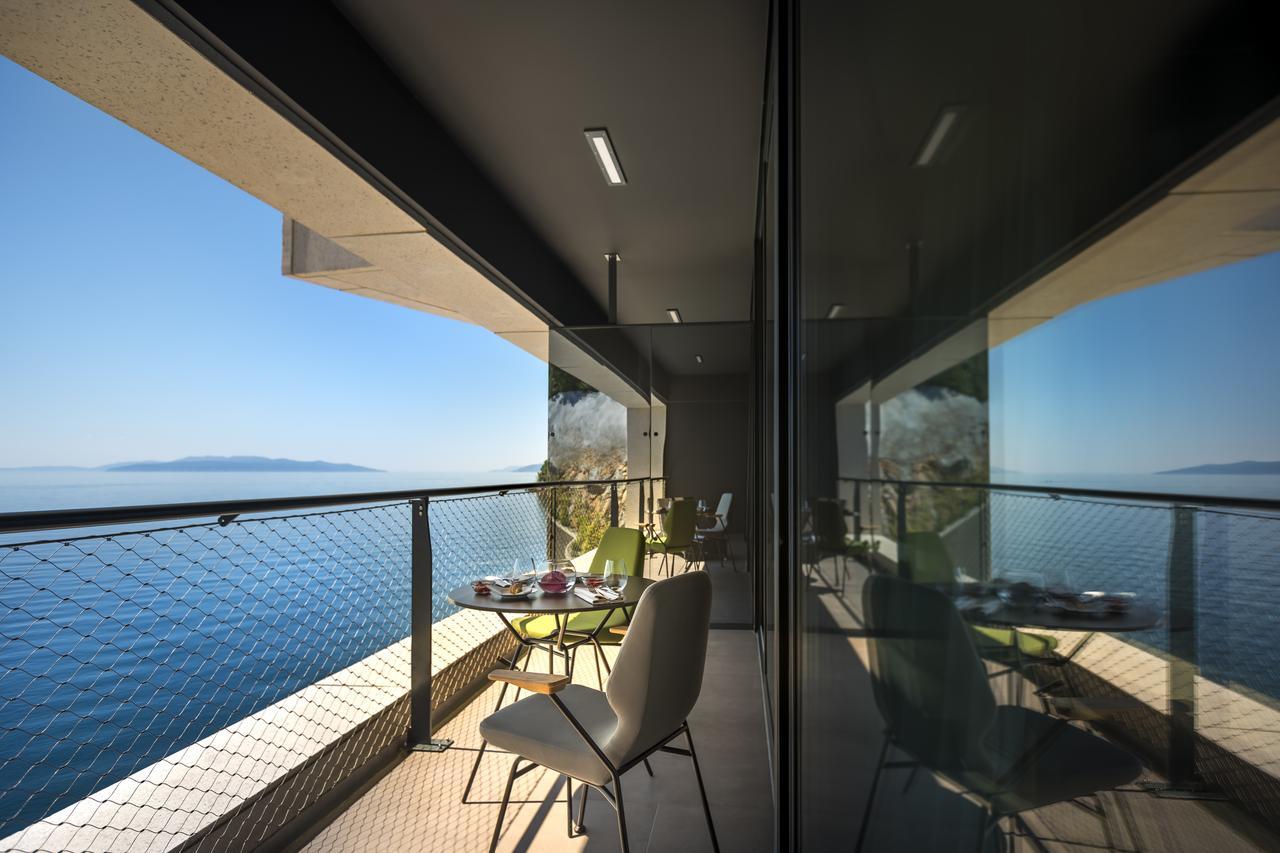 Boutique & Design Hotel Navis Opatija Exterior photo The view from the balcony of a suite at the hotel