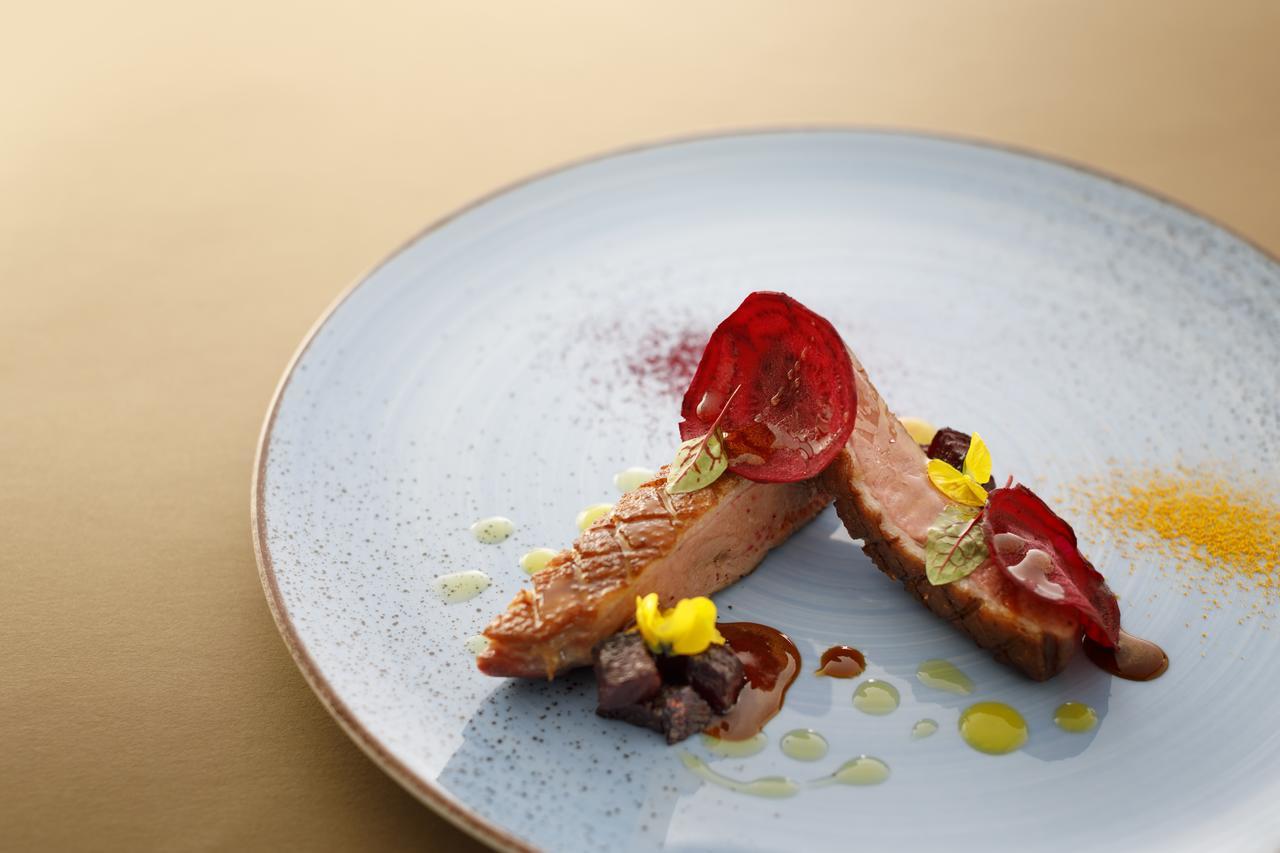 Boutique & Design Hotel Navis Opatija Exterior photo A modern French dish