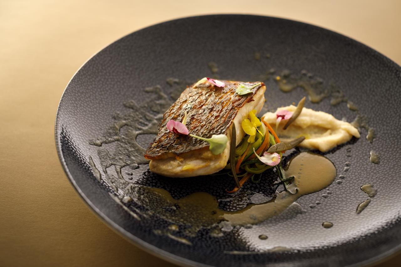 Boutique & Design Hotel Navis Opatija Exterior photo A dish prepared by the restaurant